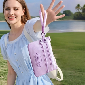 Purple waterproof nylon travel passport holder with three zippers and wrist strap