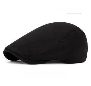 Detail view of the black cotton ivy cap showing the adjustable rear strap and stitching