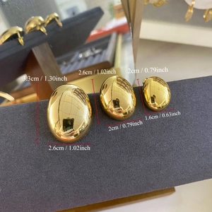Three sizes comparison of gold plated oval stud earrings with detailed dimensions in cm and inch