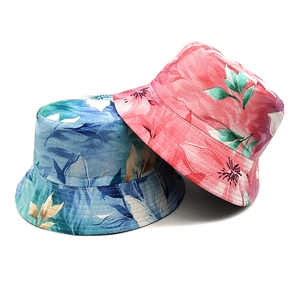 Stylish floral bucket hats for summer sun protection in blue and pink cotton fabric