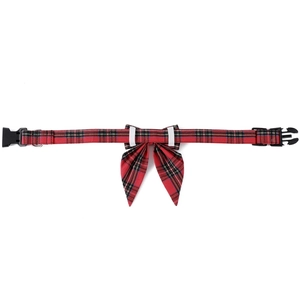Detailed view of red and black plaid dog collar with removable bow and metal D-ring