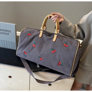 Borsa da viaggio grigia in tela con ricami ciliegia rossi e manici in pelle gialla