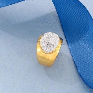 Detailed close-up of a wide gold-plated titanium steel ring encrusted with white crystals