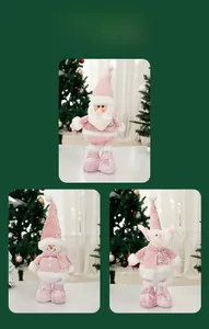 Detail view of pink sequined Santa, Snowman and Reindeer plush dolls for Christmas decor