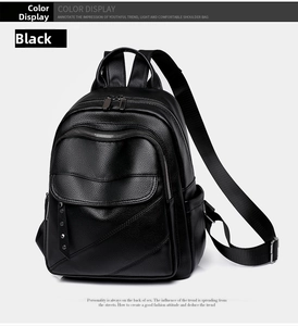 Detail of black textured PU leather backpack showing silver zippers and side pockets