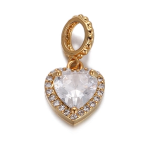 Detail of heart-shaped gold pendant featuring a clear zircon center and beaded bail