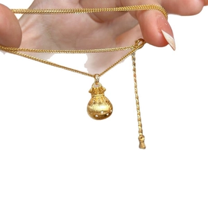 Goldene Glücksbeutel-Halskette mit mattem Finish und Zirkonia-Steinen für Damen