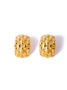 Detailed close-up of gold titanium steel earrings with a square woven texture pattern