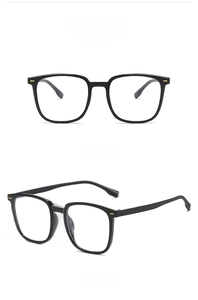 Front and 45-degree angle views of glossy black square-frame glasses with gold accents