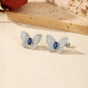 Boucles d'oreilles papillon en argent S925 avec pierre bleue et cristaux étincelants