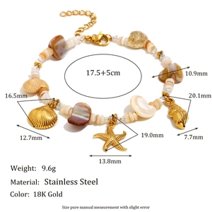 Detail of 18K gold-plated stainless steel shell charms on ocean-themed beaded bracelet