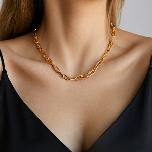 Minimalist French paperclip chain necklace in 18K gold plated brass on female model