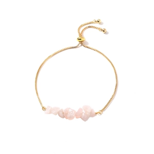 Adjustable golden box chain bracelet with pink natural stone beads on a white background