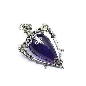 Gothic silver pendant with teardrop purple crystal featuring sword and wing details