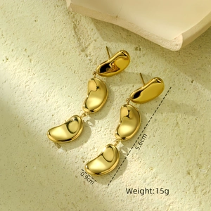 Detail view of 18K gold plated stainless steel triple bean earrings with measurements