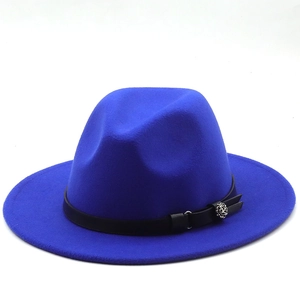 Close-up of royal blue wool fedora featuring a black leather band and silver floral buckle