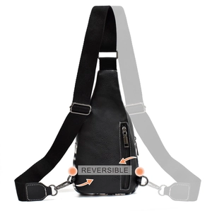 Reversible black leather bohemian crossbody chest bag with multi-zipper design