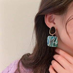 Vintage green acrylic geometric square earrings with silver pins for women on model