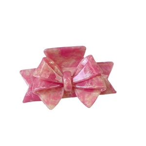 Pink marble acetate bow hair claw clip for elegant women styling with handmade logo