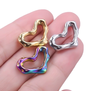 304 stainless steel hollow heart pendants in gold, silver, and rainbow finishes