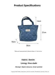 Detailed dimension guide for denim tote bag featuring white bow and heart prints