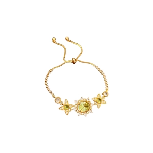 Bracelet vintage doré réglable avec zircon vert ovale et accents floraux fins