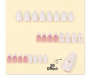 Detailansicht von Press-on-Nägeln mit rosa Farbverlauf, 3D-Blumen und weißen French Tips