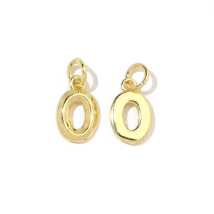 Detailed view of two 18K gold plated oval letter charms with shiny metallic finish