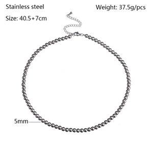 Detailed view of a 5mm stainless steel bead necklace with lobster clasp and extension chain