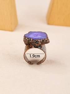 Detail view of Bohemian wide bronze ring with purple crystal and 1.9cm inner diameter