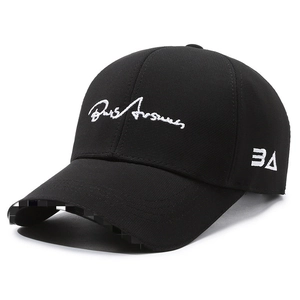 Classic black baseball cap with white embroidered signature and curved brim design
