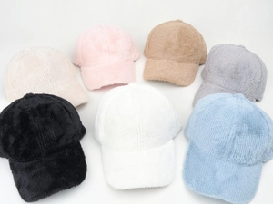 Detailed flat lay of plush striped baseball caps in seven assorted winter colors