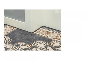 Detailed view of gray and beige classic pattern floor mat with precise edge seaming