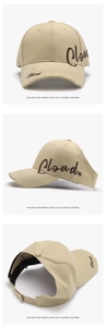 Detailed close-up of khaki ponytail baseball cap with vintage Cloud embroidery and frayed brim