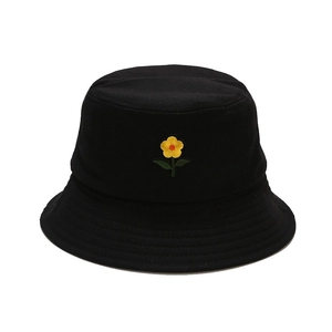 Black cotton bucket hat with yellow flower embroidery for summer sun protection outdoors