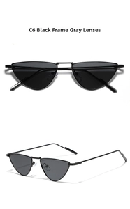 Detail view of model C6 cat-eye sunglasses with black metal frames and grey lenses