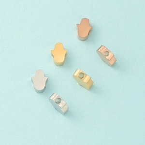 Polished stainless steel Hamsa Hand beads in gold, silver, and rose gold for jewelry making