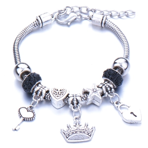 Silver snake chain charm bracelet with crown, heart pendants and black crystals