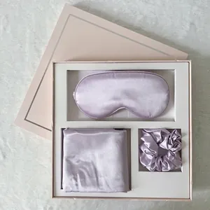 Silk sleep set with eye mask, pillowcase and scrunchie in a pink gift box display