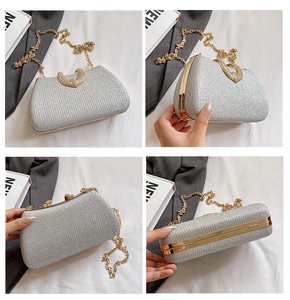 Detailed views of a silver glitter evening clutch with gold chain strap and U-shaped buckle