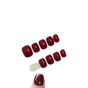 Minimalist deep wine red press-on nails set with glossy finish on white background