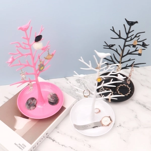 Bird tree jewelry stand for earrings and necklaces in pink, white, and black colors