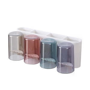 Wall-mounted four-cup toothbrush holder set with Morandi color cups and storage base