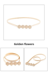 Detail view of golden flower buckle with brushed texture on elastic metal spring belt