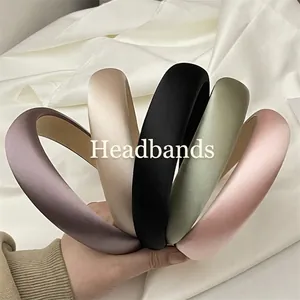 Padded satin headbands in multiple colors featuring elegant silk sheen and high crown design