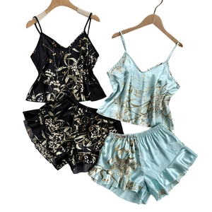 Women's ice silk floral pajama set with camisole top and ruffle shorts in black and blue