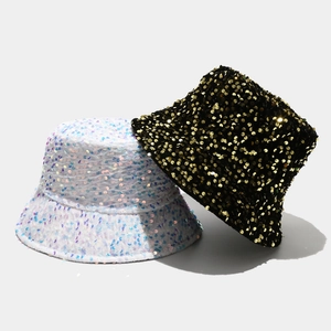Fashionable sequined bucket hat in black and white colors with reflective shiny surface