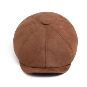 Klassieke bruine suède newsboy pet met achthoekig ontwerp en vintage uitstraling