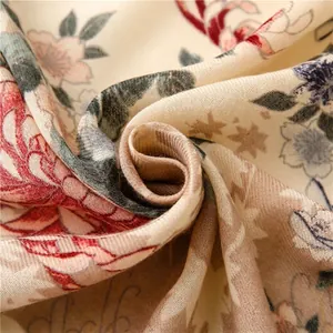 Vintage floral linen scarf in beige with rust red flower patterns and rolled edges
