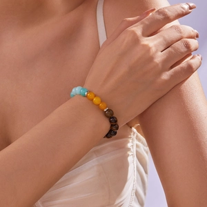 8mm natural stone beaded bracelet with gradient colors and silver spacers on wrist